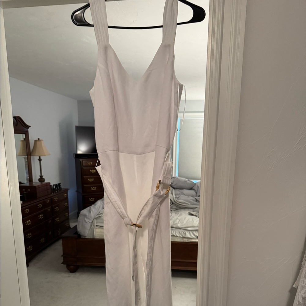 Elegant White V-Neck Jumpsuit with Tie Waist